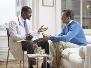 Maryland Disability Attorney Doctor Discussing Medicine in His Clinic With a Patient